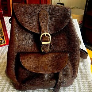 Great condition! Brown vintage Eddie Bauer pebbled leather backpack.11”x14”